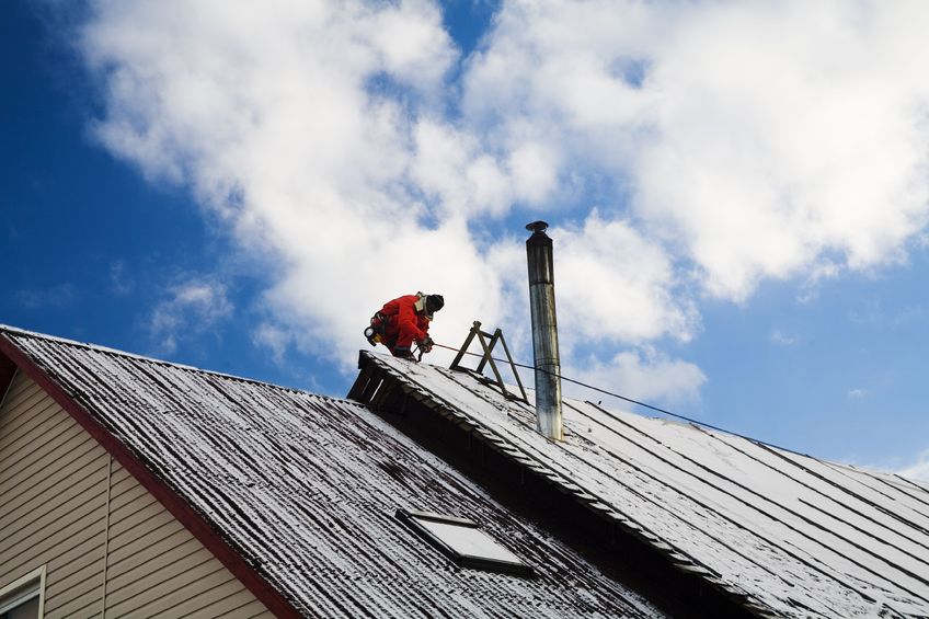 Signs of a Flat Roof Leak and When to Call Maryland Commercial Roofing Professionals